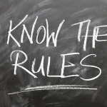 A chalkboard message that reads, Know the rules!
