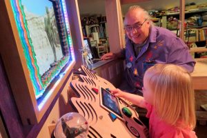 A child playing a game that measures her sustained attention.