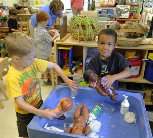 Children playing in a quality childcare environment.