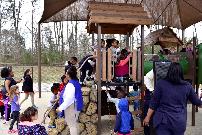 Shade over climbing structures helps protect children from the sun and the heat when the temperature is high.