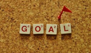 "Goal" spelled out with scrabble tiles.