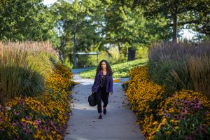student walking outside on NSCC campus