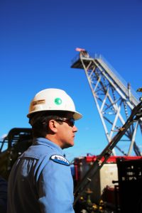 Image of an inspector looking at a job site