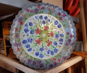 Oil painting on an old plate