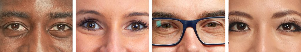 A close up picture of the eyes of several people