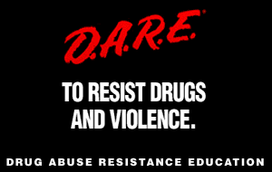 Logo of the D.A.R.E. program. The text reads: 'D.A.R.E. To Resist Drugs and Violence.' At the bottom, it says 'Drug Abuse Resistance Education.' The word D.A.R.E. is written in bold red script, while the rest is in white capital letters on a black background.