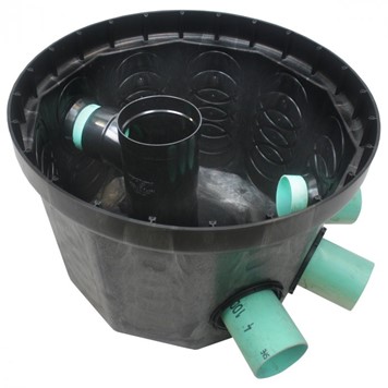 A plastic distribution box. It’s a round, plastic container with an inlet pipe and three outlet pipes.